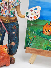 Load image into Gallery viewer, paper mache female painter/artist with a cute cat sculpture