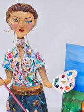 Load image into Gallery viewer, paper mache female painter/artist with a cute cat sculpture