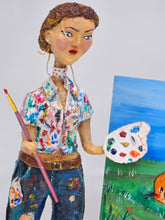 Load image into Gallery viewer, paper mache female painter/artist with a cute cat sculpture

