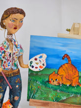 Load image into Gallery viewer, paper mache female painter/artist with a cute cat sculpture
